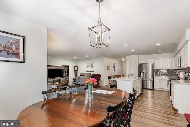 2069 Spring Wood Ln, Mechanicsburg, PA 17055 - dining area featuring a chandelier, recessed lighting, and light wood-style flooring