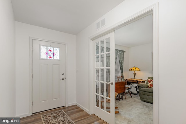 2069 Spring Wood Ln, Mechanicsburg, PA 17055 - entryway with wood finished floors and baseboards