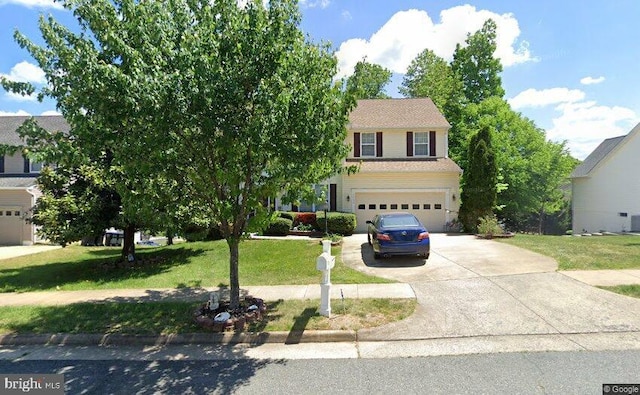 1002 Black Oak Ct, Fredericksburg, VA 22401 - view of front of house featuring concrete driveway, a front yard, and a garage
