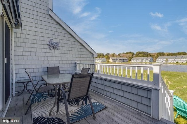 9707 Village Ln Unit 9704-4, Ocean City, MD 21842 - wooden deck with outdoor dining area