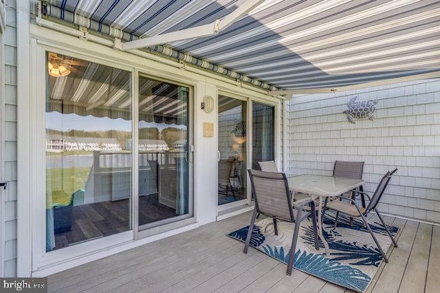 9707 Village Ln Unit 9704-4, Ocean City, MD 21842 - wooden terrace featuring outdoor dining space