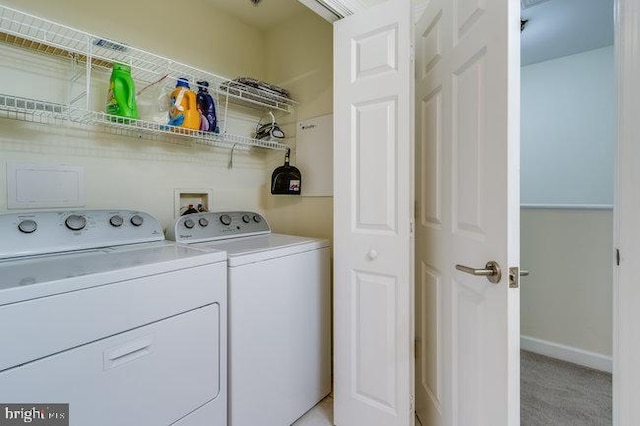 9707 Village Ln Unit 9704-4, Ocean City, MD 21842 - laundry area with washing machine and dryer and light carpet