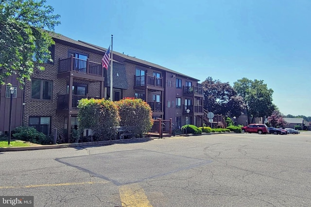 5200 Hilltop Dr Unit A2, Brookhaven, PA 19015 - view of building exterior with uncovered parking