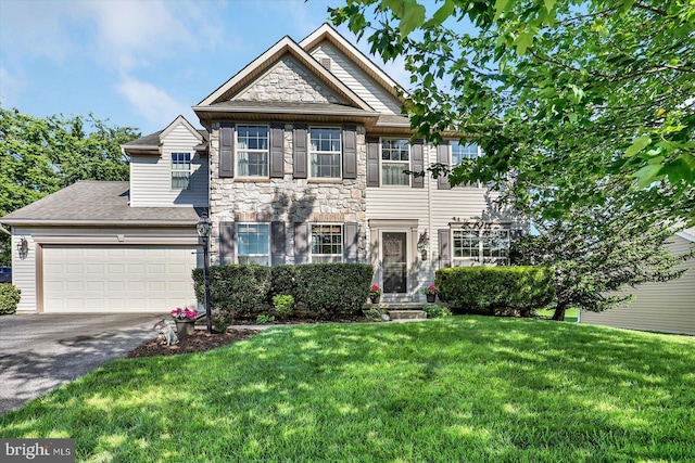 64 S 3rd St, New Freedom, PA 17349 - view of front facade featuring driveway, stone siding, a garage, and a front lawn