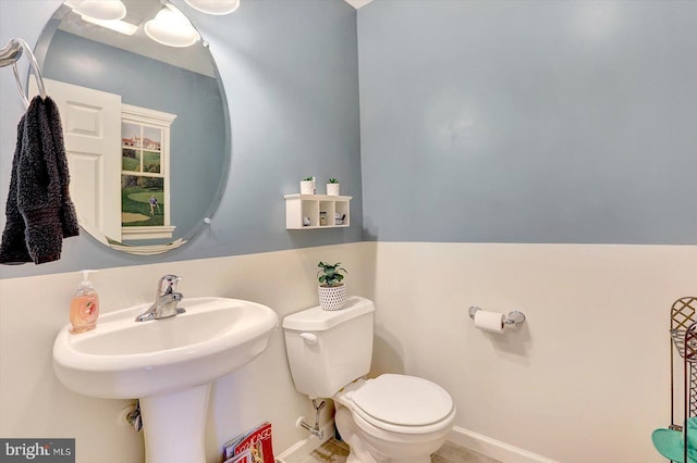 64 S 3rd St, New Freedom, PA 17349 - bathroom with toilet and baseboards