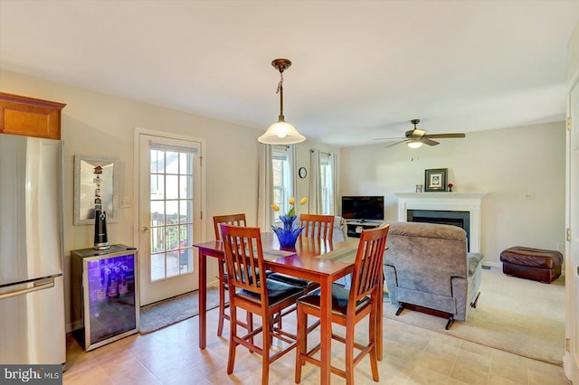 64 S 3rd St, New Freedom, PA 17349 - dining space with plenty of natural light, ceiling fan, and a fireplace