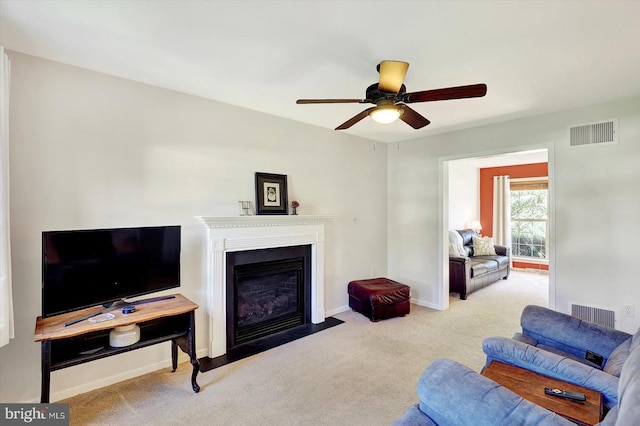 64 S 3rd St, New Freedom, PA 17349 - carpeted living area with a glass covered fireplace and a ceiling fan