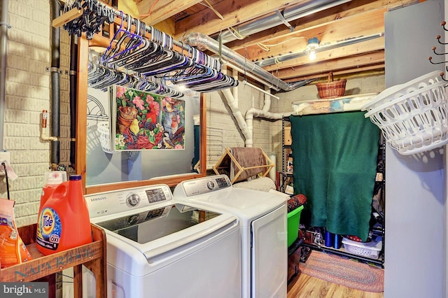 64 S 3rd St, New Freedom, PA 17349 - laundry room featuring washer and dryer and wood finished floors