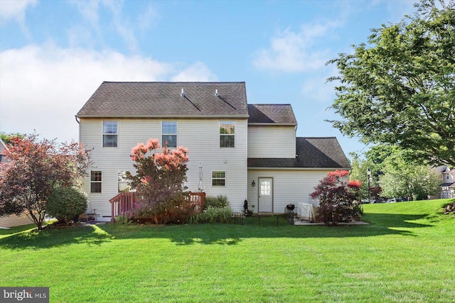 64 S 3rd St, New Freedom, PA 17349 - back of house featuring a yard