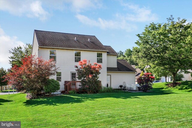 64 S 3rd St, New Freedom, PA 17349 - rear view of property featuring a lawn and a deck