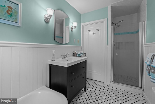 613 Arbor Rd, Cheltenham, PA 19012 - bathroom with wainscoting, a shower stall, and vanity