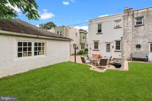 613 Arbor Rd, Cheltenham, PA 19012 - back of house with a patio, a yard, stucco siding, and a shingled roof