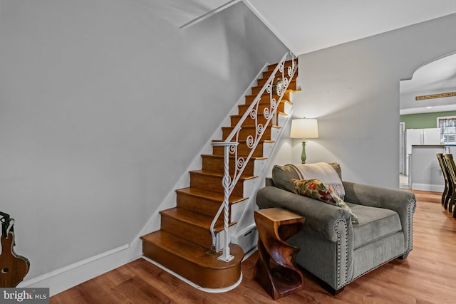 613 Arbor Rd, Cheltenham, PA 19012 - stairs featuring wood finished floors and arched walkways