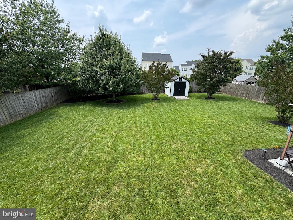 8710 Brenton Dr, Easton, MD 21601 - fenced backyard featuring a shed