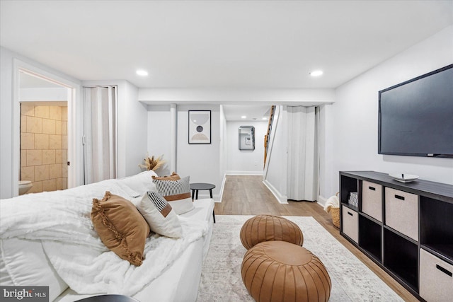 903 Mount Holly St, Baltimore, MD 21229 - living room featuring light wood-style flooring and recessed lighting