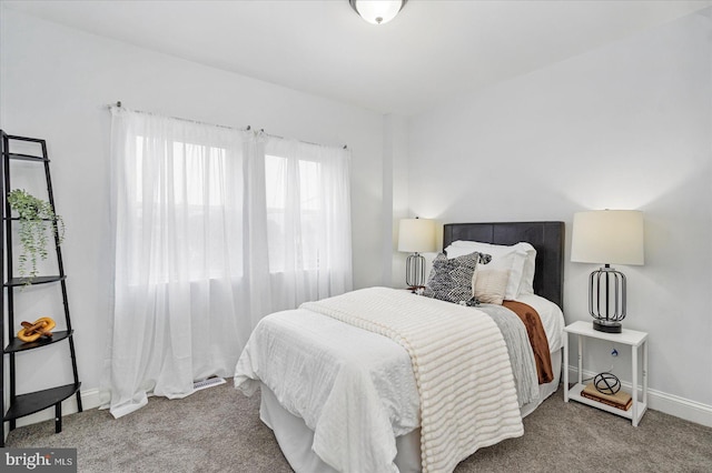 903 Mount Holly St, Baltimore, MD 21229 - bedroom with carpet floors and baseboards