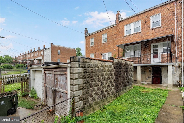 903 Mount Holly St, Baltimore, MD 21229 - back of house with brick siding