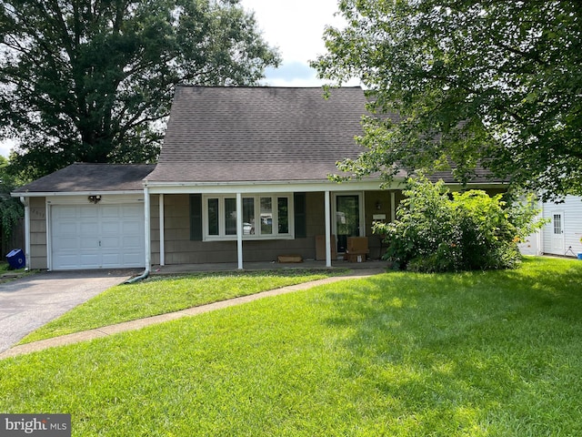12617 Beechfern Ln, Bowie, MD 20715 - cape cod-style house featuring an attached garage, asphalt driveway, a front lawn, and roof with shingles