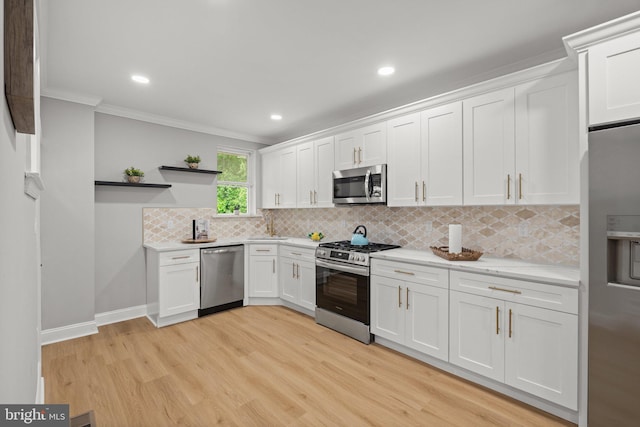 7632 Fayette St, Philadelphia, PA 19150 - kitchen featuring stainless steel appliances, open shelves, crown molding, light wood finished floors, and white cabinetry