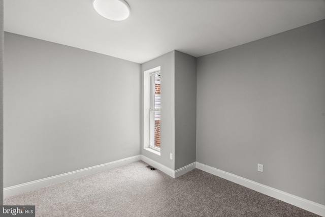 7632 Fayette St, Philadelphia, PA 19150 - carpeted empty room with baseboards