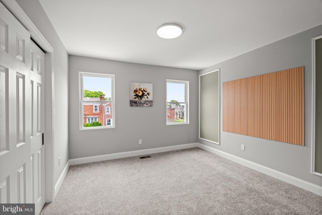 7632 Fayette St, Philadelphia, PA 19150 - unfurnished bedroom with multiple windows, carpet, and a closet