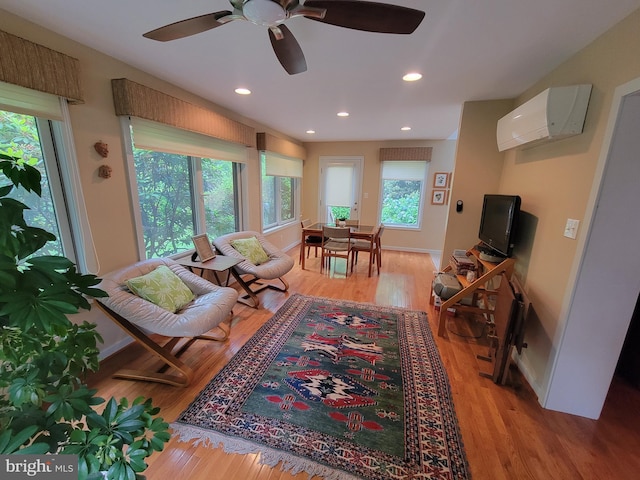 7 E Cardiff Ct, Newark, DE 19711 - living room featuring a wall unit AC, light wood finished floors, a ceiling fan, and recessed lighting