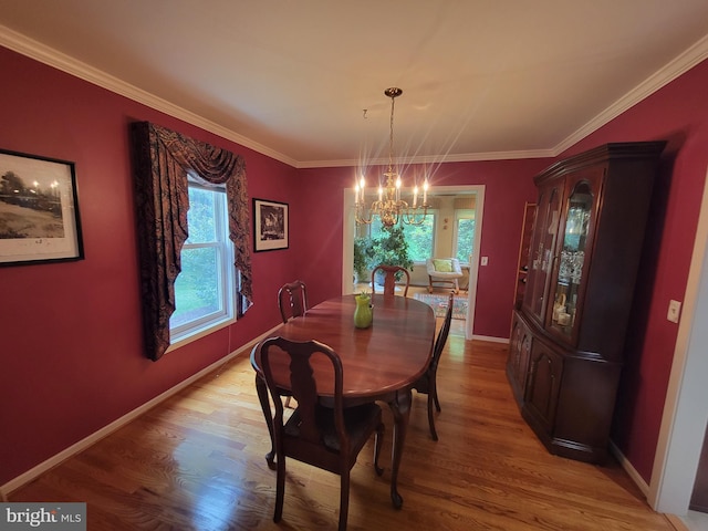 7 E Cardiff Ct, Newark, DE 19711 - dining area with a chandelier, light wood-style flooring, and ornamental molding