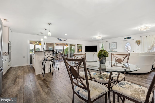 644 Chester River Beach Rd, Grasonville, MD 21638 - dining space featuring dark wood-type flooring and recessed lighting