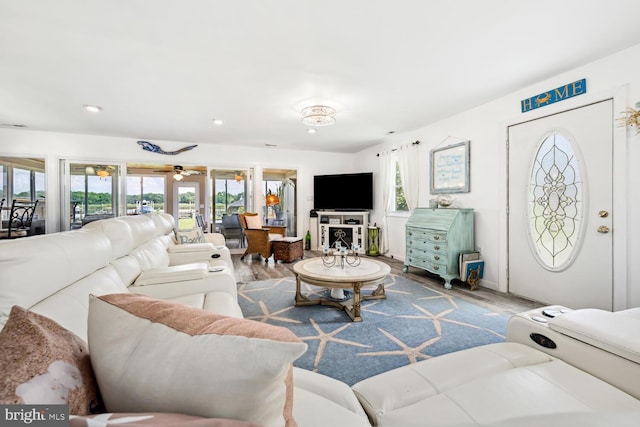 644 Chester River Beach Rd, Grasonville, MD 21638 - living room with healthy amount of natural light, wood finished floors, recessed lighting, and a ceiling fan