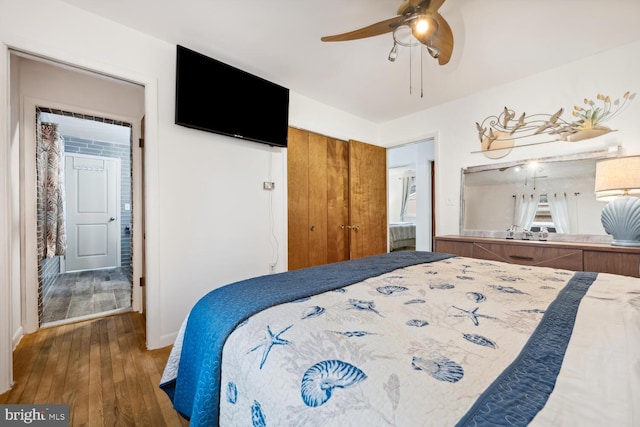 644 Chester River Beach Rd, Grasonville, MD 21638 - bedroom with wood-type flooring and ceiling fan
