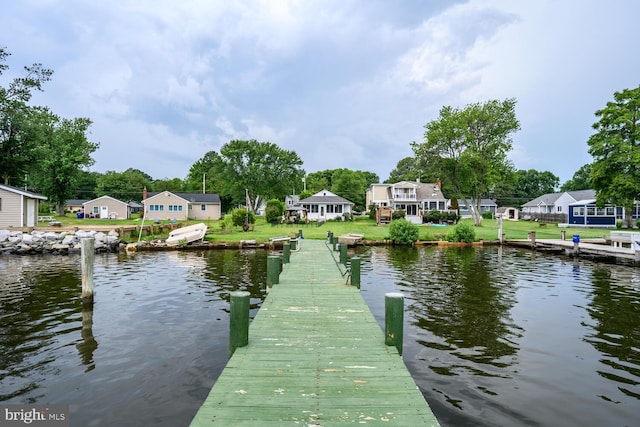 644 Chester River Beach Rd, Grasonville, MD 21638 - dock with a water view, a residential view, and a yard