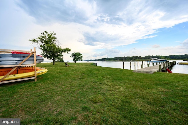 644 Chester River Beach Rd, Grasonville, MD 21638 - view of grassy yard with a boat dock and a water view