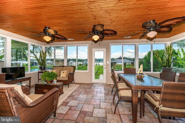 644 Chester River Beach Rd, Grasonville, MD 21638 - sunroom / solarium featuring stone tile flooring and wood ceiling