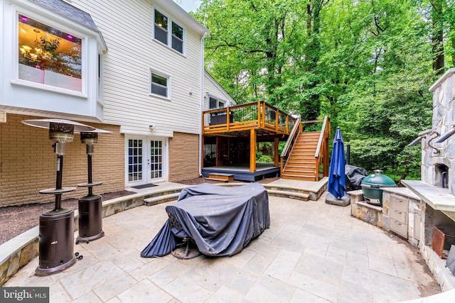 2930 Fox Mill Rd, Oak Hill, VA 20171 - view of patio with french doors, stairs, a wooden deck, and an outdoor kitchen