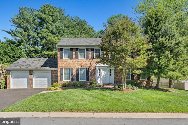 6 Ivywood Ct, Silver Spring, MD 20904 - colonial inspired home with an attached garage, driveway, and brick siding