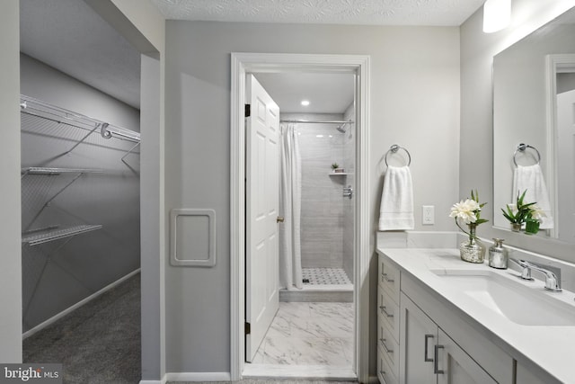 6 Ivywood Ct, Silver Spring, MD 20904 - bathroom featuring vanity, a shower stall, marble finish floors, and a spacious closet