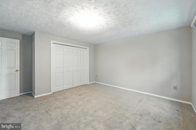 6 Ivywood Ct, Silver Spring, MD 20904 - unfurnished bedroom featuring carpet, a closet, and a textured ceiling