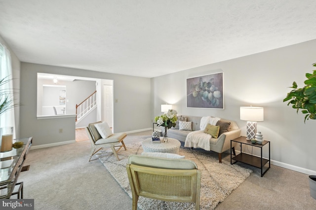 6 Ivywood Ct, Silver Spring, MD 20904 - carpeted living area with stairs and a textured ceiling