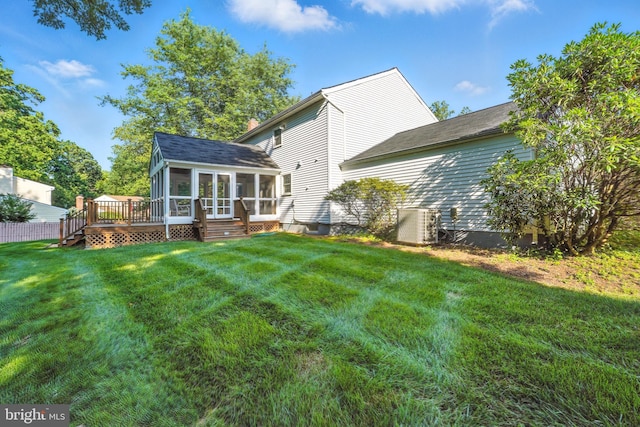 6 Ivywood Ct, Silver Spring, MD 20904 - back of property with a sunroom, a lawn, and a deck
