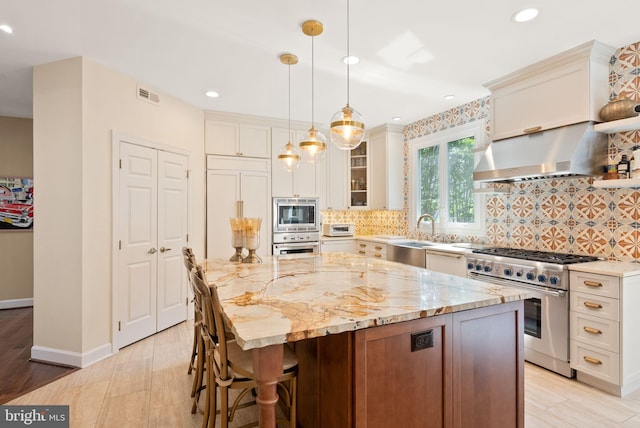 10915 Lamplighter Ln, Potomac, MD 20854 - kitchen featuring stainless steel appliances, a kitchen island, range hood, tasteful backsplash, and light stone countertops