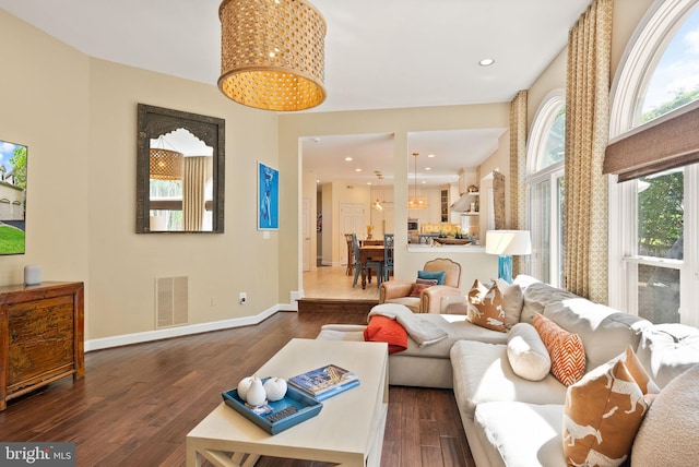 10915 Lamplighter Ln, Potomac, MD 20854 - living room featuring dark wood-style floors and recessed lighting