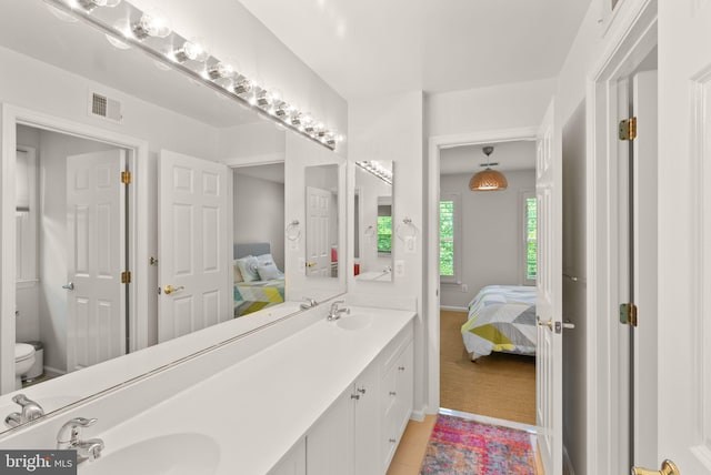 10915 Lamplighter Ln, Potomac, MD 20854 - full bath with connected bathroom, double vanity, and tile patterned floors