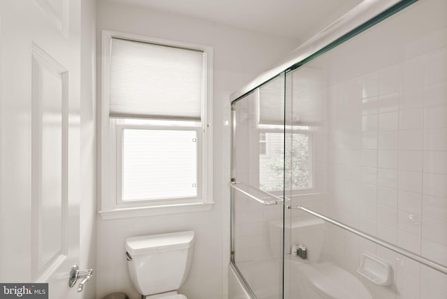 10915 Lamplighter Ln, Potomac, MD 20854 - bathroom featuring toilet and bath / shower combo with glass door