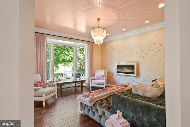 10915 Lamplighter Ln, Potomac, MD 20854 - living area featuring wallpapered walls, ornamental molding, recessed lighting, a glass covered fireplace, and wood finished floors
