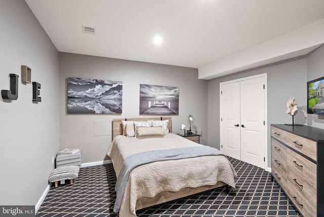 10915 Lamplighter Ln, Potomac, MD 20854 - bedroom with dark carpet and a closet