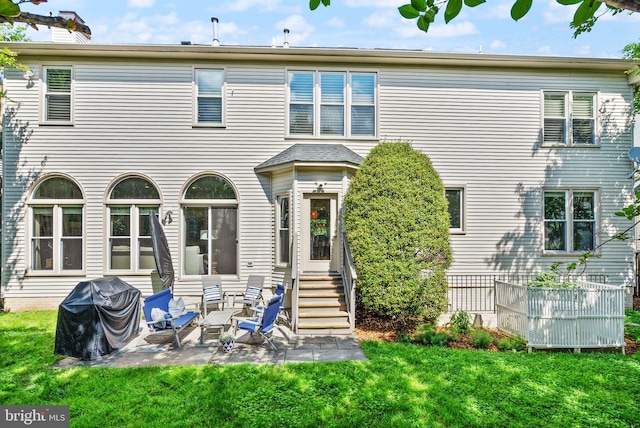 10915 Lamplighter Ln, Potomac, MD 20854 - back of house with a patio area and a chimney