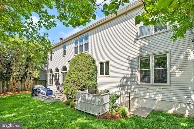 10915 Lamplighter Ln, Potomac, MD 20854 - rear view of house featuring a patio