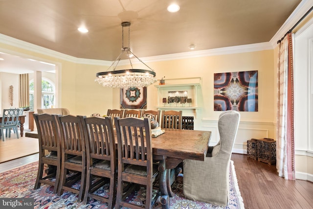 10915 Lamplighter Ln, Potomac, MD 20854 - dining area featuring a chandelier, wood finished floors, ornamental molding, and recessed lighting
