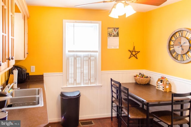 556 Hillcrest Rd, York, PA 17403 - dining area with a wainscoted wall, healthy amount of natural light, ceiling fan, and wood finished floors