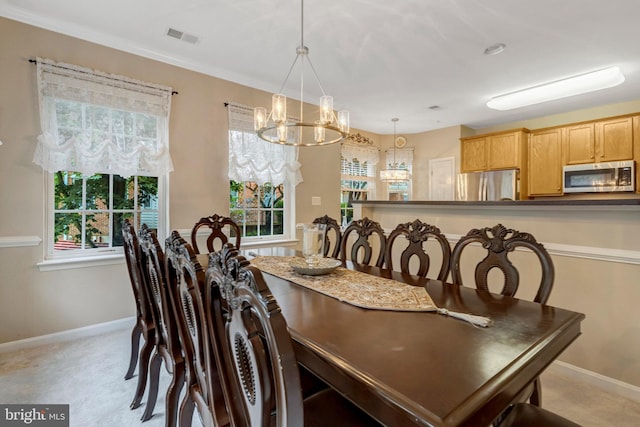 20810 Noble Ter Unit 104, Sterling, VA 20165 - dining area with a chandelier, healthy amount of natural light, and light carpet
